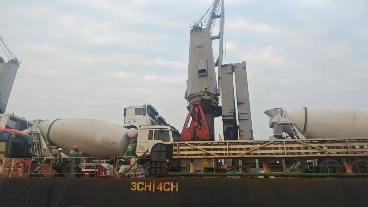 Trucks being loaded at a port